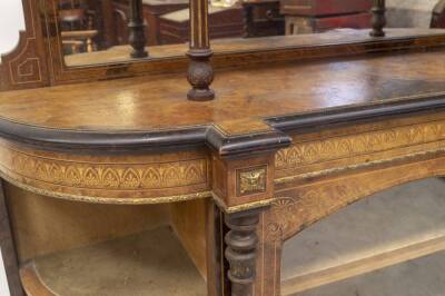 A Victorian figured walnut side cabinet, with gilt scratch carved and boxwood strung decoration to the upper part, with shelf, mirror and gilt metal mounts, the shaped base having open shelved D ends, below an ebonised moulding and enclosing a single arch - 2