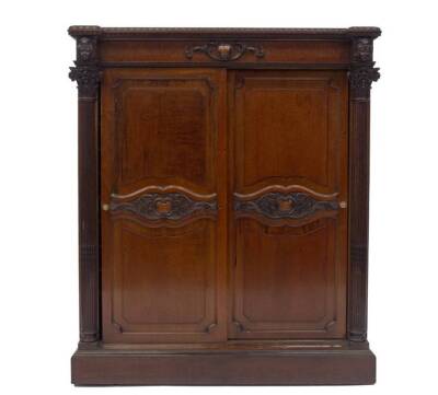 A Victorian mahogany folio or music cabinet, with inverted breakfront top, having egg and dart moulding, scroll and cartouche frieze, two central sliding doors having carved centres, fielded and shaped upper and lower panels, revealing a series of shelves - 2