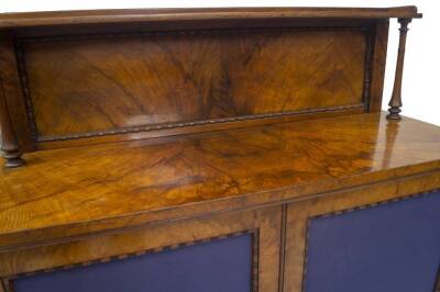 A Victorian figured walnut chiffonier, with shelved and moulded back, with ring turned taper supports, two moulded panelled doors with baize covers, plinth base, 92cm H, 120cm W, 46cm D. - 3