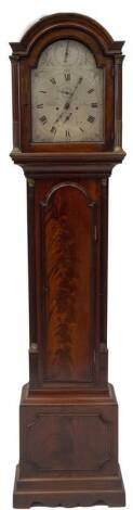 William Carter of London. A 19thC flamed mahogany longcase clock, with arched hood, with Corinthian capital columns with brass reeding and fluting, full length arch moulded door with quarter inset reeded columns, over a flamed and moulded panelled base, w