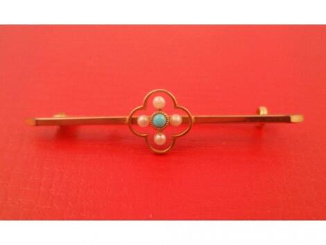 A late Victorian bar brooch with quatrefoil seed pearl and turquoise set