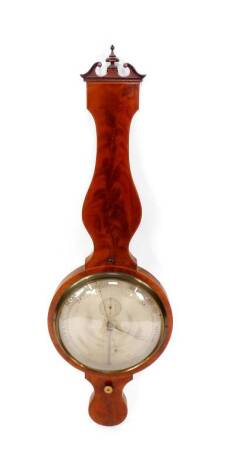 A George III large dialed wheel barometer, with engraved steel dial incorporating a hygrometer and thermometer, 31 cm Dia, in a shaped flame mahogany case with broken arched pediment and outlines of ebony and boxwood stringing, 113cm H.