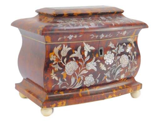 A Regency tortoiseshell tea caddy, of bombe form, decorated in mother of pearl inlay with roses and insects, the hinged lid opening to reveal twin lidded compartments, raised on ivory ball feet, 15cm H, 19cm W, 12cm D.