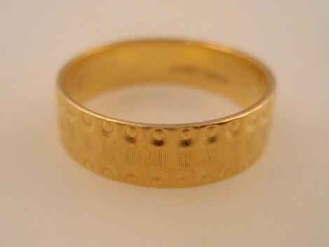 A 22ct gold wedding band