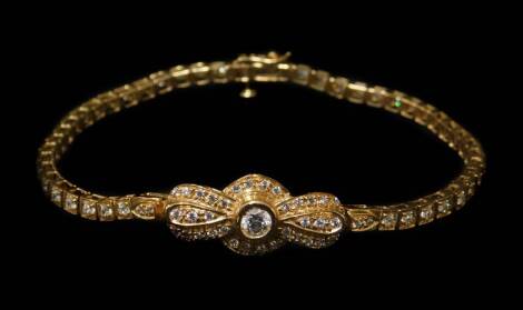 A 9ct gold bracelet, set with imitation diamonds, possibly CZ, with knot design centre, and individual square bracelet, 20cm long, 9.6g all in.