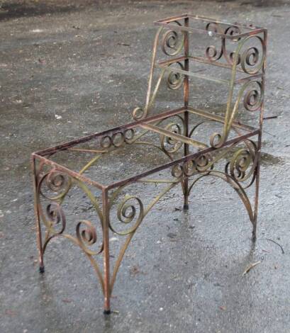 A cast iron scroll step planter, of rectangular form on pierced legs, 85cm H 81cm W 40cm D.