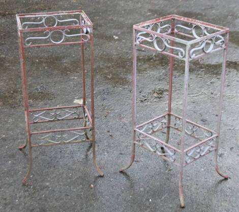 A pair of early 20thC metal planters, set with two sections, each with plain legs terminating in sabre feet, 74cm H, 32cm W, 27Ccm D.