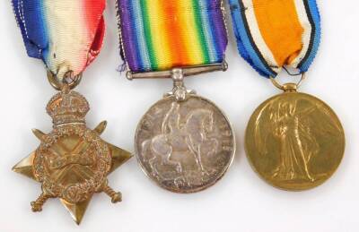 A WWI medal group, comprising of a Campaign medal, Victory medal and 1914-15 Star, each similarly marked PTE R A Plowman North N R 200143, brass Queen Mary Christmas 1914 tin, various badges, etc. (a quantity) - 2