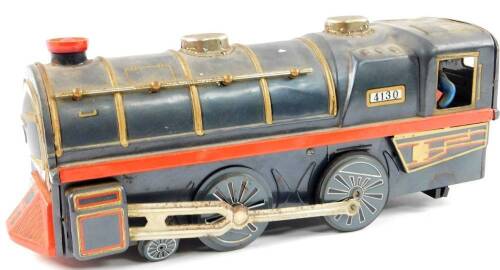 A mid 20thC tin plate train, locomotive no. 4130, in red and blue, 17cm H.