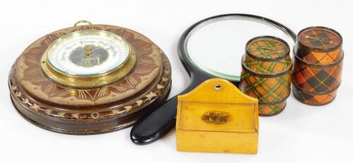 A late 19thC Tartan money box, of barrel form, 9cm H, another similar, a miniature Mauchline ware Exeter Cathedral salt box, and a ebonised hand mirror. (4)