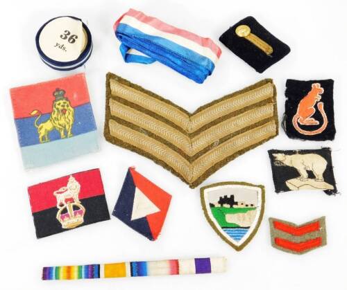 Various army issue WWI and another iron on military badges, to include Desert Rat, 6cm H, lion, epaulette, etc. (a quantity)