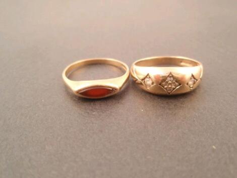 A 9ct gold signet ring set with tiny diamonds together with a stone set dress ring