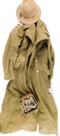 Various 20thC army equipment, a greatcoat 1939 pattern, size 9, with J Jacob Salford crow's foot label, in green, a tin helmet, 18cm H, and various other related items. (a quantity)