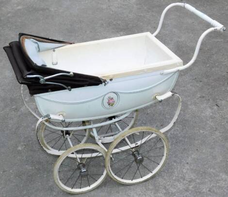 A vintage child's pram, with two size wheels, shaped handle and metal framework with articulated canopy, 58cm H.