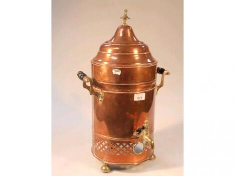 A Victorian brass and copper samovar with ebonised handles