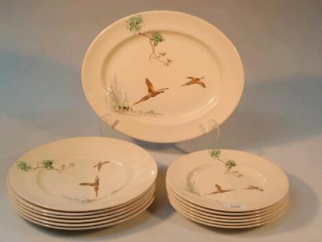 A Royal Doulton The Coppice pattern part dinner service comprising oval meat place