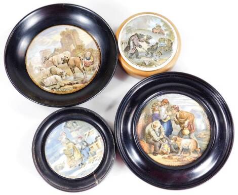 Four various 19thC Prattware pot lids, comprising of The Dutch Winter Scene, 8cm Dia., Lend A Bit, Cattle & Ruins and Bears, in wooden mounts. (4)