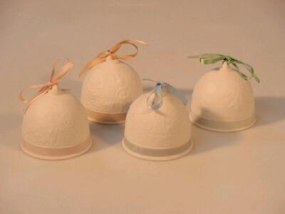 Four Lladro Collectors Society table bells