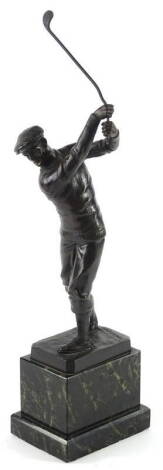 After Otto Schmidt - Hofer. Figure of a golfer, on a marble base, 44cm H.