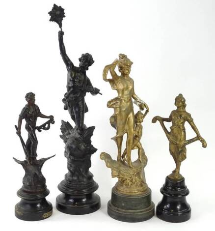 Various spelter figures, to include one example of a figure standing on the world, on ebonised base, another titled Le Travail, various sizes.