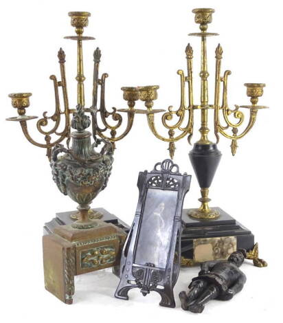 A pair of French black slate and marble three branch candelabra, carved wooden figure of a soldier etc., the candelabra 38cm H.