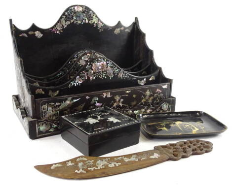 A collection of oriental items, to include a Chinese Export lacquer letter rack with mother of pearl inlay, similar box, a lacquer tray and a hardwood letter knife, carved in the form of a cutlass.