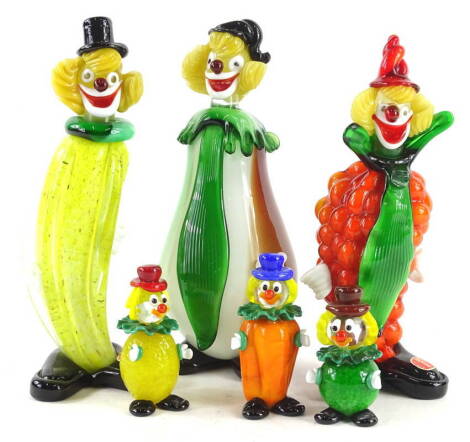 A set of three Murano glass clowns, each with original metallic label, the largest 22cm H and three smaller versions. (6)