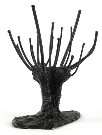 An unusual ebonised metal Scandinavian sculpture, modelled in the form of a stylised tree, label to underside for Sten Gullberg, and label for Skane-Slogad, indistinctly signed and dated 1996, 8cm W.