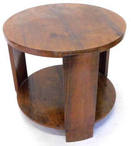An Art Deco rosewood two tier occasional table, the circular top on plain supports, 92cm dia.