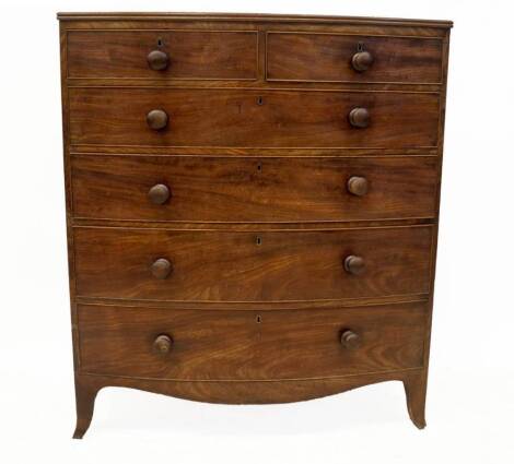 A Regency mahogany bowfront chest, of two short and four long graduated drawers, with oak linings and knob handles on splay feet, 120cm H, 106cm W, 53cm D.