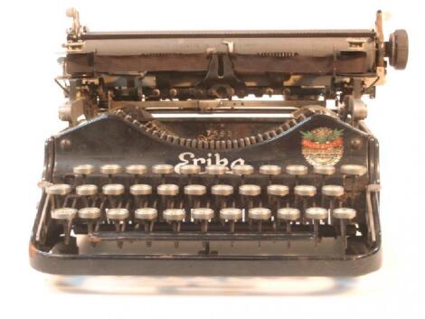 An early 20thC Erika portable typewriter