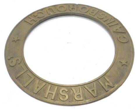 A cast brass steam or traction engine roundel, stamped Marshalls Gainsborough, 55cm dia.