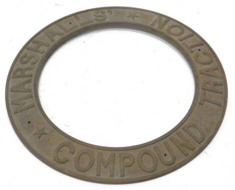 A cast brass traction or steam engine roundel, stamped Marshall Traction Compound, 54cm dia.