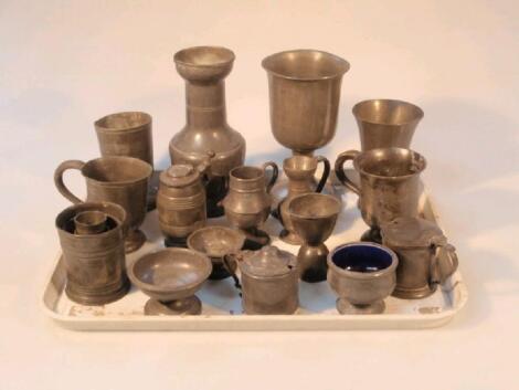 A selection of 17thC and later pewter and Brittania metal stem cups