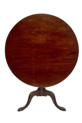 A Georgian mahogany tripod table, with circular tilt top, baluster turned pedestal, on three outsplay legs on pad feet, 95cm D.