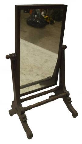 A William IV mahogany full length cheval mirror, with rectangular plate, scroll supports and legs with turned stretcher, 145cm H, 85cm W.