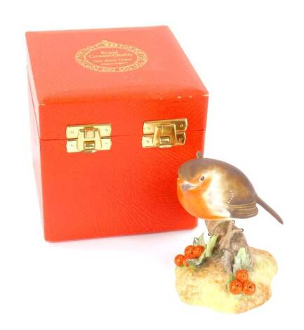 A Royal Crown Derby porcelain figure of a robin, matte glaze, boxed.