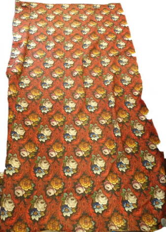 A large rug or wall hanging, in Aubusson style, decorated with multi coloured flowers, on a black ground, 621cm x 324cm.