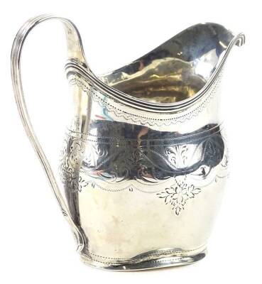 A George III silver milk jug, with engraved decoration, a reeded handle etc., London 1805, 3oz.