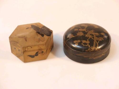 A Japanese black lacquered circular box