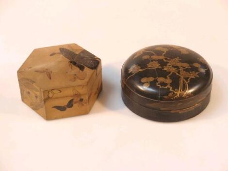 A Japanese black lacquered circular box