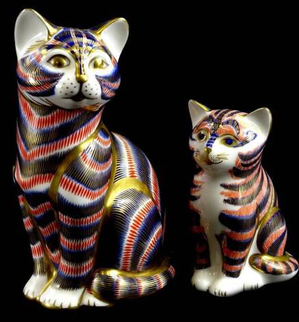 A Royal Crown Derby Imari cat, with silver button, and a Royal Crown Derby kitten, gold button, 13cm and 9cm high.