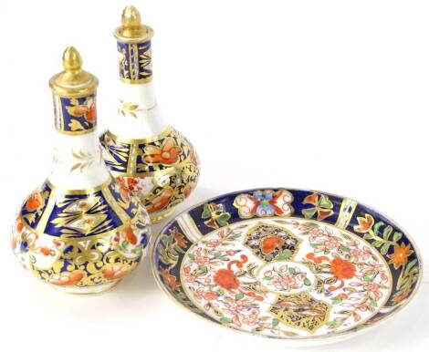 A collection of Derby ceramics, to include two Stevenson & Hancock type Imari scent bottles and a later saucer