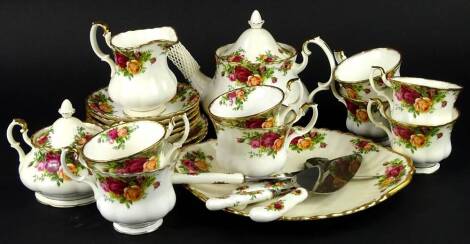 A Royal Albert porcelain Old Country Roses pattern part tea service etc., to include teapot, cups, saucers, cake slice etc.