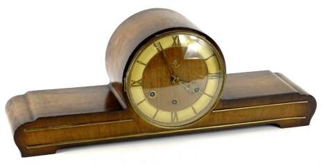 A Ker Continental walnut mantel clock, with Westminster chime with brass stringing to case, 57cm W.