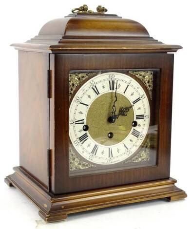 A 20thC mahogany mantel clock, the square dial, Westminster chime on block feet, 30cm H.