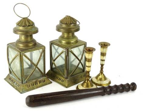 A collection of items, to include a turned wooden truncheon, a pair of brass lamps etc.