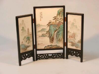 A Chinese porcelain table screen of three panels