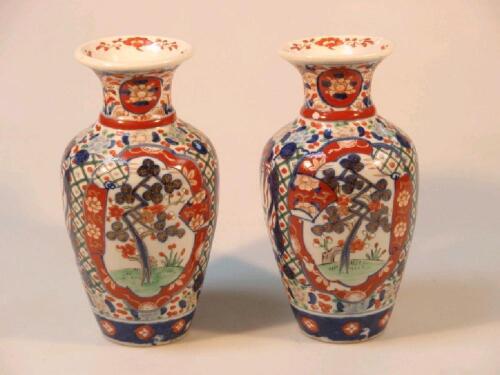 A pair of Imari ovoid vases