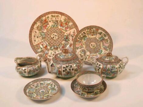 A Chinese famille rose tea service comprising tea pot